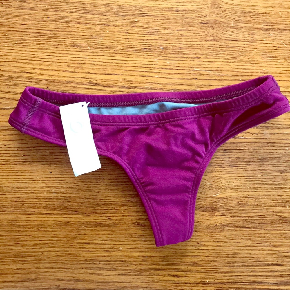 Small Jolyn Duke swim bottoms in Plum